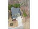 Expansive aerial view of the property showcasing its landscaping and neighborhood setting at 1680 Mint River Dr, Apex, NC 27502