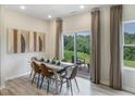 Dining room has a sliding glass door leading to a beautiful outdoor space at 2106 Cherry Creek Rd, Haw River, NC 27258