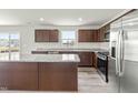 Kitchen with stainless steel appliances, granite counters and a large island at 265 Day Farm Dr, Lillington, NC 27546