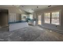 Bright kitchen features white cabinetry, an island, and stainless appliances at 100 Spumante Ct, Princeton, NC 27569
