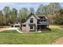 Spacious home with attached garage, manicured lawn and professional landscaping at 3601 Bivins Rd, Hillsborough, NC 27278