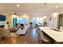 Bright and airy living room with hardwood floors and an open floor plan at 7004 Bartons Bend Way, Raleigh, NC 27614