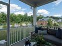 Relaxing screened patio with comfortable seating and scenic outdoor views, perfect for enjoying the fresh air at 71 Furley St, Homesite 116, Sanford, NC 27330