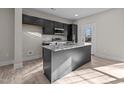Modern kitchen featuring granite countertops, stainless steel appliances, and a functional center island at 801 Pryor St # 48, Mebane, NC 27302