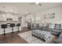 The open floor plan shows the easy access between the kitchen and the modern, cozy living room at 1401 Wrenn Rd, Durham, NC 27703