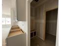 Kitchen featuring unfinished lower cabinets, and a corner nook with a seat, blending functionality and potential at 1509 Erastus Ct # 48, Fuquay Varina, NC 27526