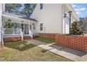 Charming back porch on this lovely home featuring brick foundation at 902 Zion Church Rd, Sanford, NC 27330