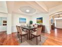 Formal dining room with hardwood floors and elegant decor at 9813 Derbton Ct, Raleigh, NC 27617