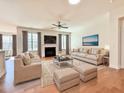 Inviting living room featuring a fireplace and cozy seating area at 9813 Derbton Ct, Raleigh, NC 27617