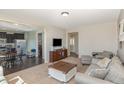Spacious living room with open layout, seamlessly connected to the kitchen and dining area at 145 Carissa Dr, Smithfield, NC 27577