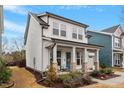 Attractive home with a cozy front porch, landscaped yard and a private driveway at 190 Retreat Dr, Fuquay Varina, NC 27526