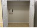 Walk-in closet with carpeted floors, shelving, and great storage for a tidy and organized home at 21 Suncrest Ct, Durham, NC 27703