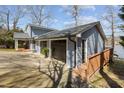Spacious attached three car garage with convenient access and ample parking space at 220 Choctaw Dr, Louisburg, NC 27549