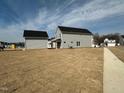 Spacious backyard with newly installed grass, perfect for outdoor activities and relaxation at 30 Nimble Way # 171, Clayton, NC 27520
