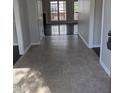 Inviting entryway featuring tiled floors, neutral paint, and a view into the living area at 3109 Benton Cir, Raleigh, NC 27615