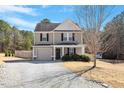 Lovely two-story home featuring a garage, driveway, and beautiful landscaping at 40 Golden Timber Cir, Four Oaks, NC 27524