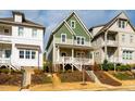 Charming multi-level home with varied siding, inviting porch, and well-maintained landscaping at 650 Great Ridge Pkwy, Chapel Hill, NC 27516