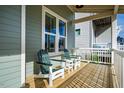 Inviting front porch featuring comfortable seating and a peaceful atmosphere at 650 Great Ridge Pkwy, Chapel Hill, NC 27516