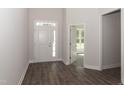 Inviting foyer with hardwood floors and natural light streaming through the front door at 20 Watermelon Dr, Franklinton, NC 27525
