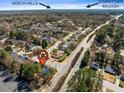 Aerial view of the neighborhood with easy access to North Hills and Downtown Raleigh at 2428 Havershire Dr, Raleigh, NC 27613