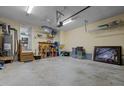 Spacious garage offering ample storage space, featuring utility connections, and easy access to the house at 3809 Mardela Spring Dr, Raleigh, NC 27616