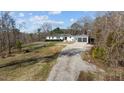 Exterior shot of a house with a long driveway at 4200 Us 1 Highway South, Kittrell, NC 27544