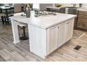Spacious kitchen island with seating, storage, and a decorative countertop at 6646 Woodlawn Dr, Oxford, NC 27565