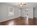 Bright living room features hardwood floors and neutral paint at 617 Bernice St, Durham, NC 27703