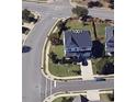 Aerial view of two-story home and lot, showing its landscaping, driveway, and surrounding neighborhood at 1001 Hope Springs Ln, Morrisville, NC 27560