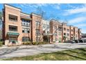 Spacious brick building with multiple balconies, complemented by lush landscaping and convenient parking at 7250 Hwy 751 # 2109, Durham, NC 27707