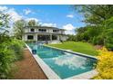 A stunning lap pool and outdoor area, perfect for relaxation and recreation in your backyard at 132 Edward Booth Ln, Durham, NC 27713