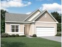 New construction single-story home with attached garage, a well-manicured lawn, and neutral siding at 46 Rolling Banks Dr, Louisburg, NC 27549