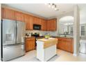 Well-equipped kitchen with stainless steel appliances and a convenient center island at 7810 Spungold St, Raleigh, NC 27617