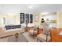 Cozy living room with hardwood floors, built-in bookshelves, and comfortable seating at 2 Poplar Ave, Elon, NC 27244