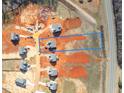 An aerial view of the property with a blue outline, showcasing its prime location and surroundings at 4889 Grosbeak Ct, Mebane, NC 27302
