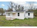 Back view of a cozy single-story home with a well-maintained lawn at 501 N 14Th St, Erwin, NC 28339