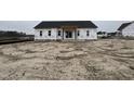 New home construction featuring back windows at 880 Olive Branch Dr, Smithfield, NC 27577