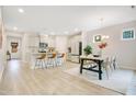 Open concept kitchen and dining area with modern finishes and natural light for a warm, inviting feel at 121 Sacred Fire Rd, Louisburg, NC 27549