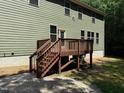 Wooden deck featuring stairs for easy access to the backyard at 3005 Domaine Dr, Wake Forest, NC 27587