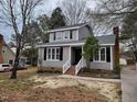 Well-maintained two-story home with a cozy front yard at 4604 Sweet Melody Ln, Knightdale, NC 27545