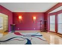 Spacious living room featuring hardwood floors and decorative lighting fixtures at 4709 Delta Lake Dr, Raleigh, NC 27612