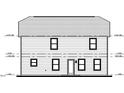 New construction home featuring a simple rear elevation with several windows at 1129 Mashie Ln, Rocky Mount, NC 27804