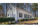 A charming one-story house displays its well-manicured landscaping, enhancing curb appeal at 166 Creek Dr, Louisburg, NC 27549