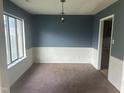 Dining room with a large window providing plenty of natural light and fresh air at 2408 Stadium Dr # A, Durham, NC 27704