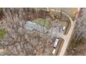 Aerial view of a home on a large lot with mature trees at 3405 Wilsons Mills Rd, Smithfield, NC 27577
