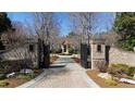 Open brick entrance gate leading to an upscale property, enhancing curb appeal at 2421 Acanthus Dr, Wake Forest, NC 27587