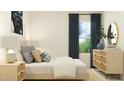 Cozy bedroom featuring natural light, soft bedding, woven nightstand, and decor at 244 St Andrews Dr, Zebulon, NC 27597