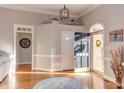 Bright foyer with hardwood floors, high ceilings, and decorative details and natural lighting at 3109 Doe Hill Ct, Raleigh, NC 27612