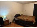 Picture of a bedroom with a bed and a nightstand at 322 Junction Rd # 17D, Durham, NC 27703