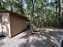 Outbuilding with a picnic table; enjoy the outdoors! at 106 Indian Cv, Louisburg, NC 27549